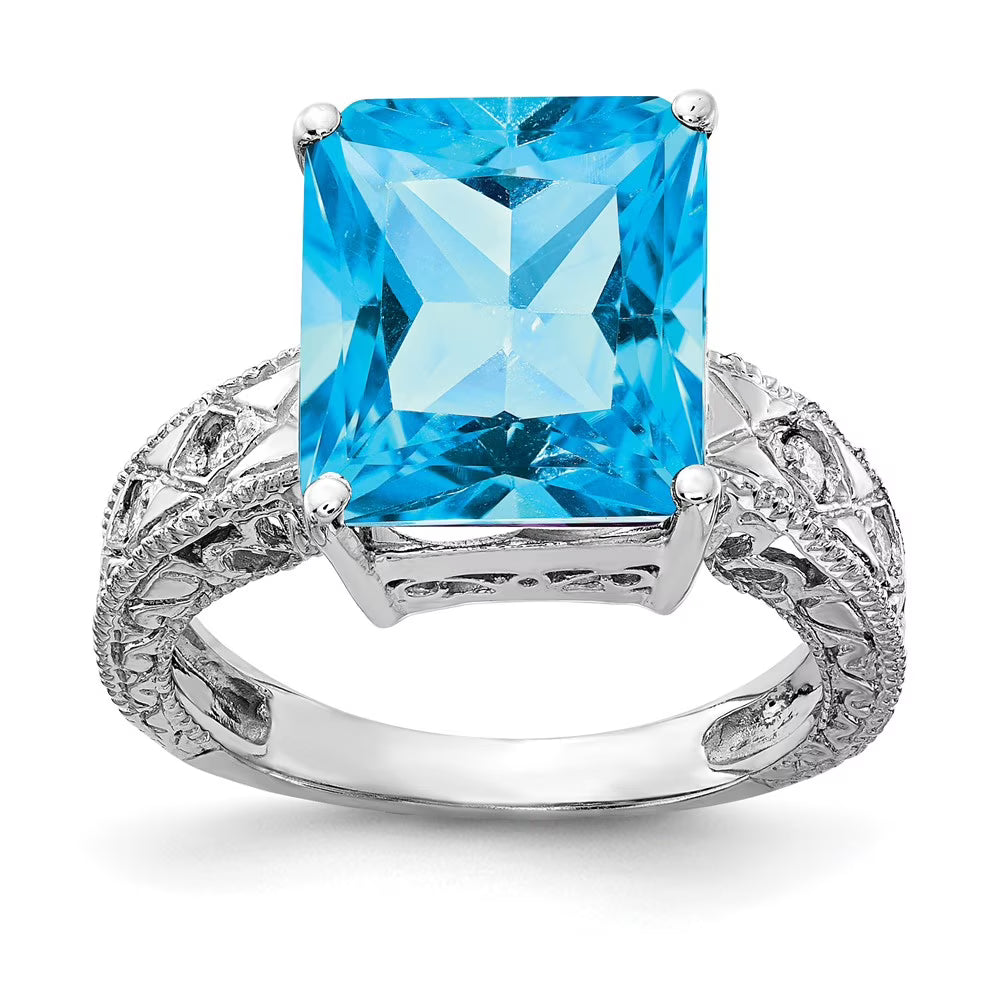 14 Karat White Gold Emerald Cut Blue Topaz and Diamond Ring L791427